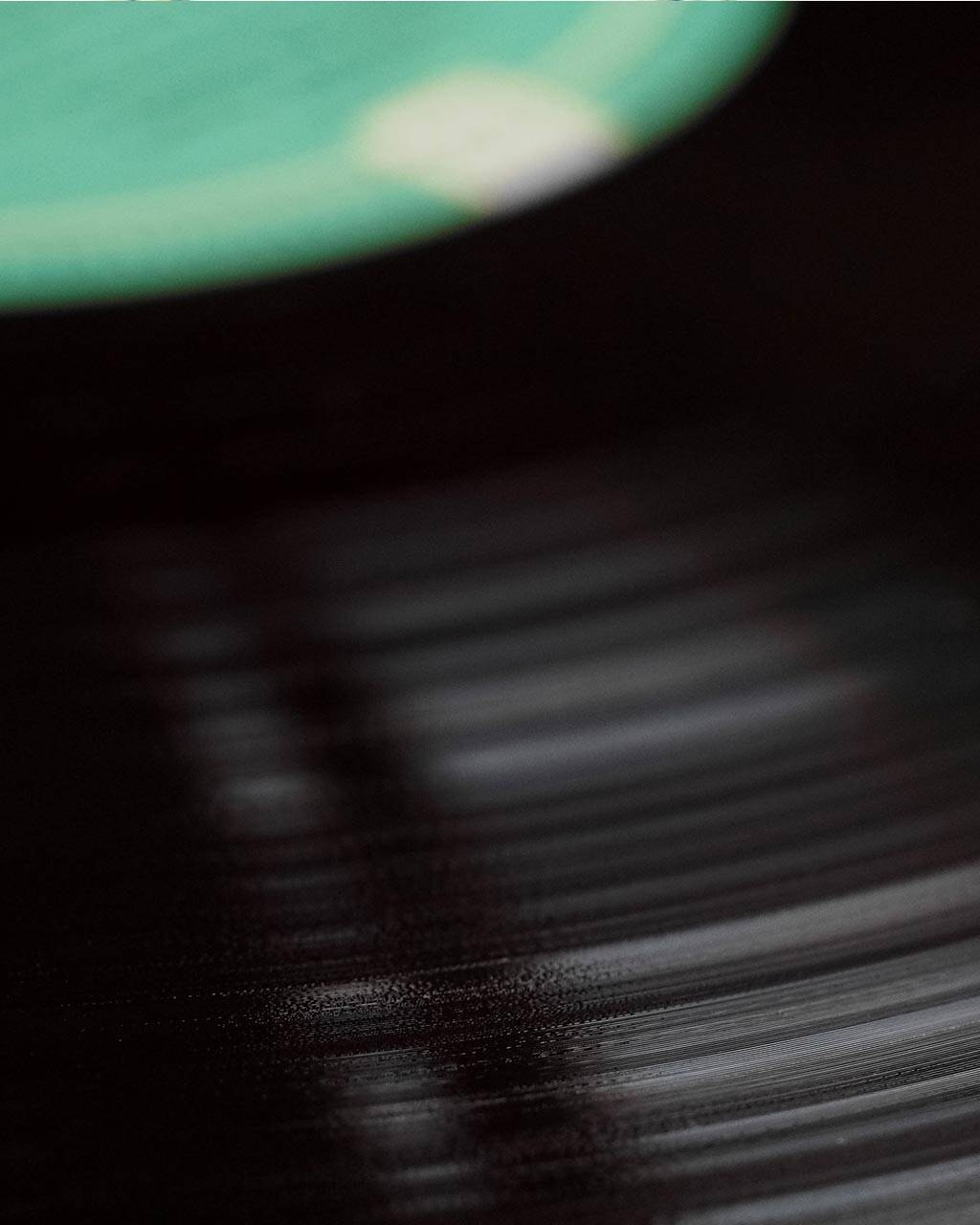Close-up of a vinyl record on a turntable